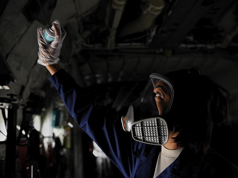 Quality Pest Control technician spraying for pests in Karachi